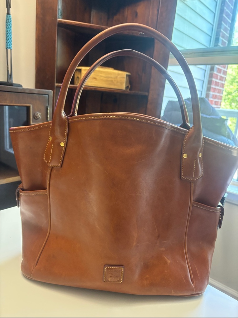 Dooney & Bourke Red Lined Interior with Branded Tag